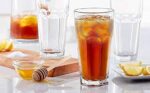 Verres droits à facettes 300 ml servis avec thé glacé et citron