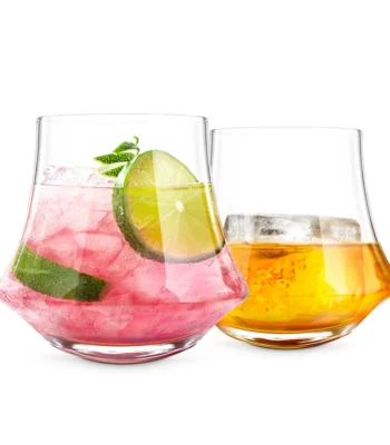 Verres tumbler transparents à base évasée avec jus et boisson fraîche